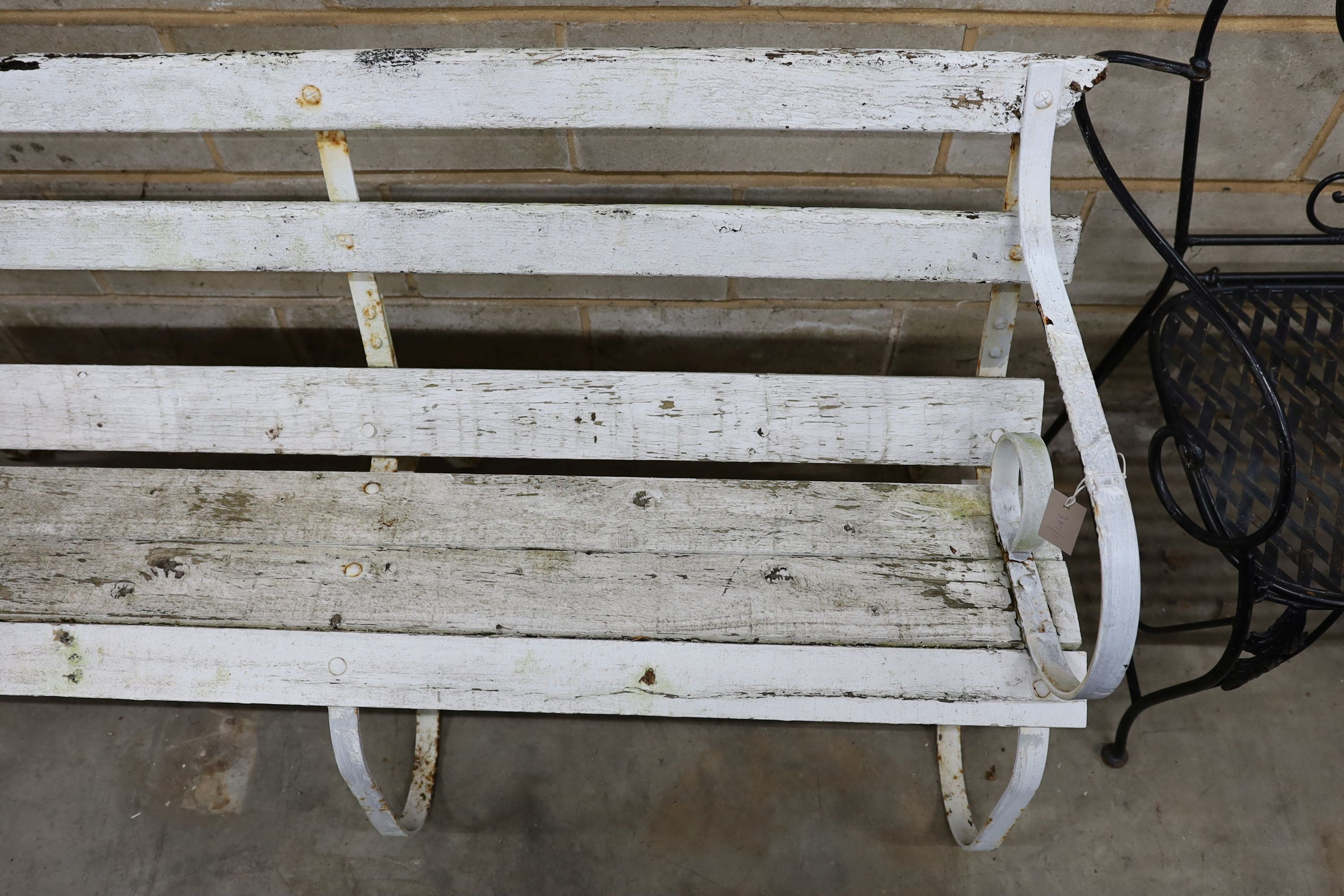 A painted wrought iron slatted wood garden bench, length 154cm, depth 46cm, height 82cm